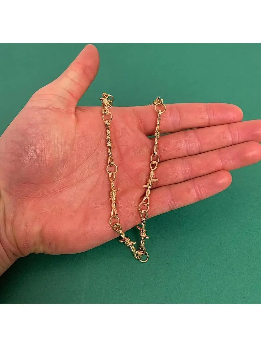 Y2k gold barbwire opium punk style chocker necklace. Cool design. Nice quality.